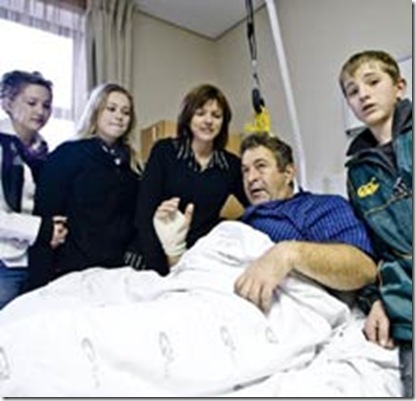 Maree Chris hospital bed fought robbers with bare hands to save family June102009Beeld