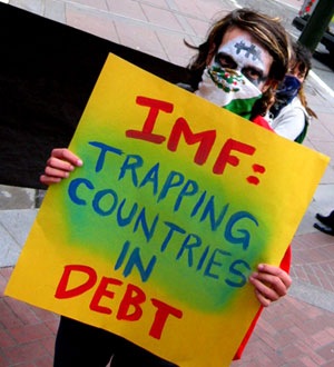 [imf-trapping-countries-in-debt[2].jpg]