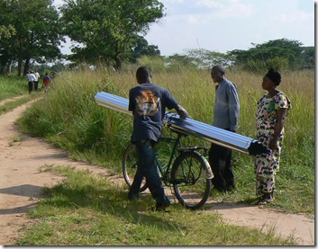 carrying roof sheeting on bike