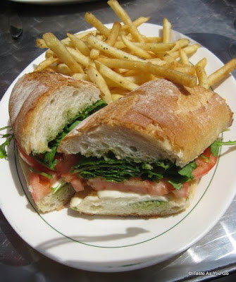 Fresh Tomato, Mozzarella, and Basil Panini with Pesto Sauce with French Fries at Masso in Long Island City, NY | Taste As You Go