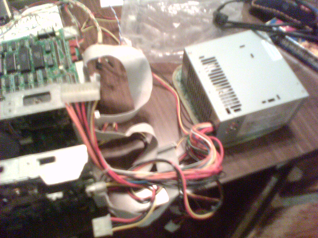 A reused PC power supply, with lots of dangerous loose wires.