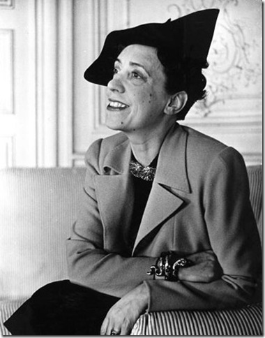 Elsa Schiaparelli wearing a jacket of her new magenta color known as, Shocking.  (Photo by John Phillips//Time Life Pictures/Getty Images)