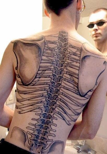 star tattoos for men on ribs. Been seeing more and more of these skeletal back tattoos lately.