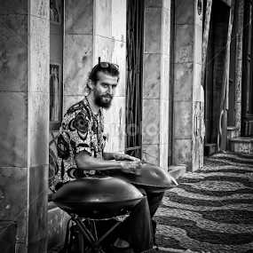 Street musician in Cascais by Luís Dias - Black & White Portraits & People