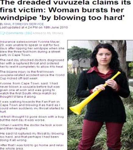 Mulher assopra vuvuzela