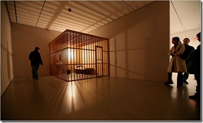 Performance 1: Tehching Hsieh, at the Museum of Modern Art, displays a wooden cage like one in which the artist spent a year, doing nothing. Chester Higgins Jr./The New York Times