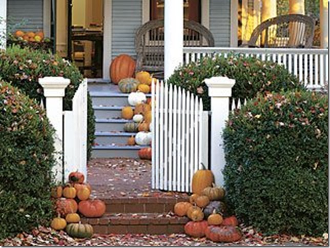 cottage living porch pumpkins