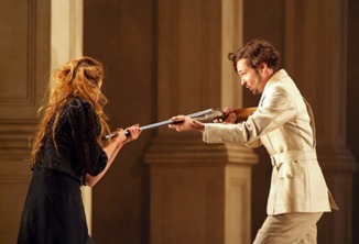 Christophe Dumaux as Tolomeo in Händel's GIULIO CESARE at the Opéra de Lille, with Charlotte Hellekant as Cornelia [Photo by Frédéric Iovino]