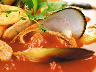 Delicious Mediterranean style tomato seafood soup w