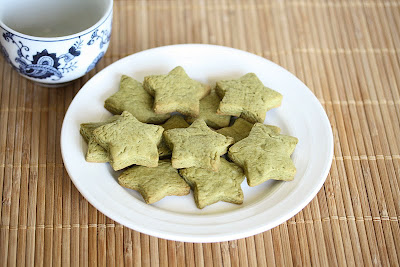 photo of a plate of star-shaped Matcha Green Tea Sugar Cookies