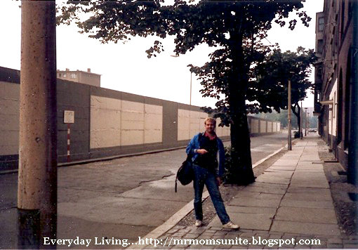 photo of me in front of the Berlin Wall