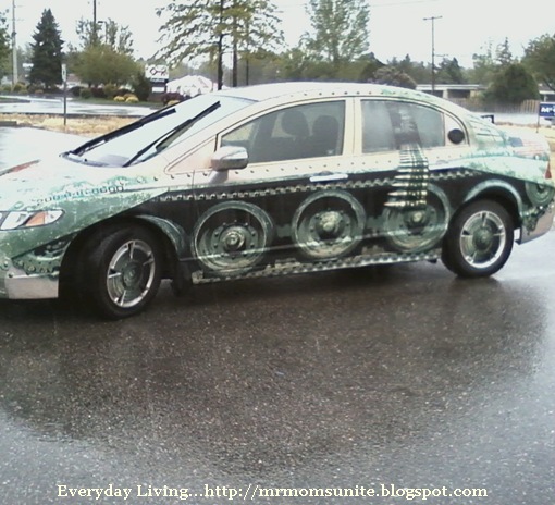 photo of a car painted like a tank