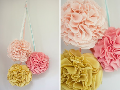 Combine circles of fabric chinese lanterns and hot glue to make these 