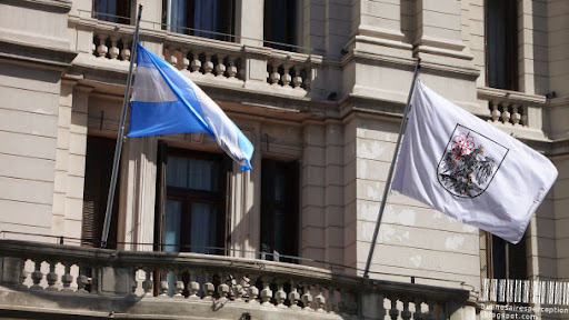 The City Flag of the Autonomous City of Buenos Aires together with the National Flag of Argentina