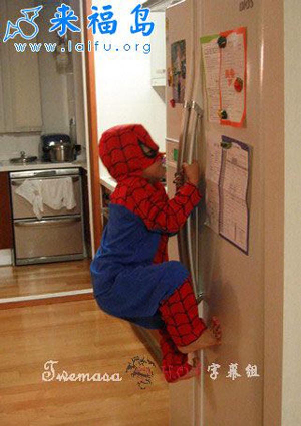 15 reasons why boys need strict parents - Baby boy spiderman on a refrigerator
