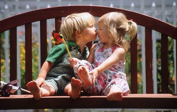 15 reasons why boys need strict parents - Baby boy kissing a baby girl