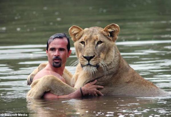 Ranger with a lioness