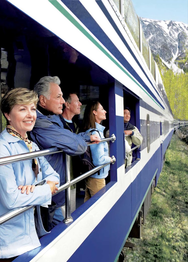Many Princess Cruises guests extend their stay in Alaska and take in the scenic landscapes on the observation platform of their glass-domed rail car.