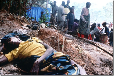 Rwandan refugees passed a body in a refugee camp in Congo in 1997.