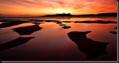 DAWN_OVER_DUNSTANBURGH_NEIL_MAUGHAN
