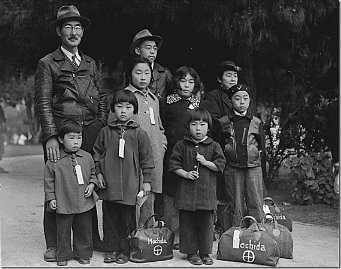 Japanese_American_Internment_-_Members_of_the_Mochida_Family_Awaiting_Evacuation_1942 (1)