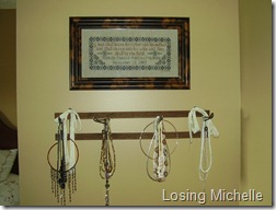 Antique towel rack used as for necklaces...
