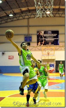 Rey Katipunana (23) leads the fast break for an easy 2 points.
