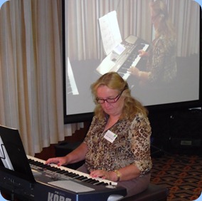 Desiree Barrows playing Len Osbourne's keyboard. Desiree has the same model herself and played very well for her debut at the Club!