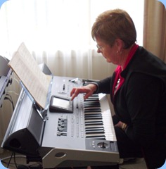 Pam Rea setting-up the latest Korg arranger keyboard - the Pa3X