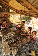 A Family Sorting Pebbles for Selling at Abra de Ilog