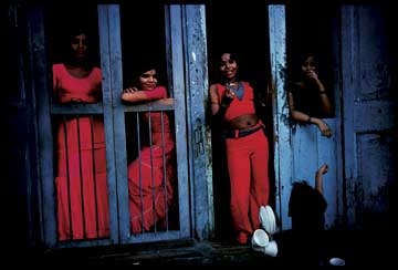 [Several times each day the madam and her girls have tea, which is brought in from cafes and vendors on the street.[3].jpg]