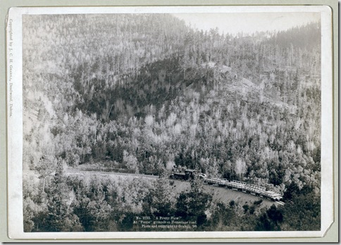 Title: "A pretty view." At "picnic" grounds on Homestake Road
Distant view of a train engine and several cars against a large wooded area. 1890.
Repository: Library of Congress Prints and Photographs Division Washington, D.C. 20540
