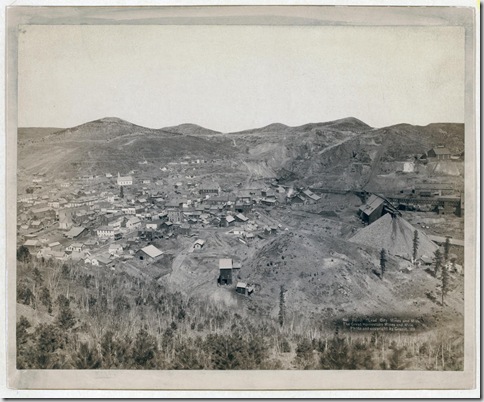 Title: Lead City Mines and Mills. The Great Homestake Mines and Mills
Distant view of mining town; hills in background. 1889.
Repository: Library of Congress Prints and Photographs Division Washington, D.C. 20540