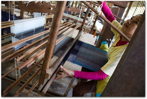Weaving silk into a loom