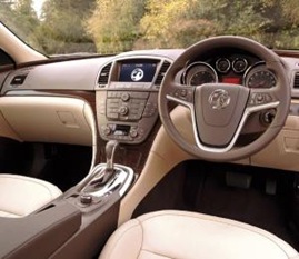 This is the interior - beige leather and light brown dash panels
