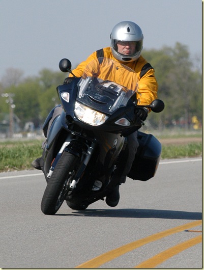 John Flora aboard his new BMW K1200GT. Suit is the BMW Summer one-piece coverall, helmet is the Schuberth Concept. Photo taken by Maria J. Flora on Ind. 75 just south of Thorntown, Ind.                          