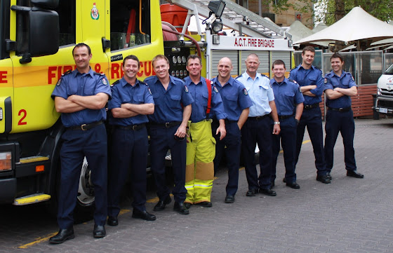 firefighters posing