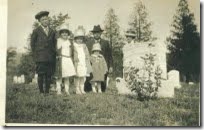 Grampie, Grammie behind the tombstone Joy, Laurel, Bessie, Valeda