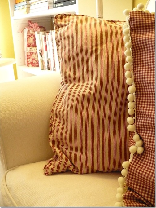 red ticking and toile pillows
