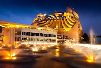 The Casino de Montreal glimmers in the evening. 