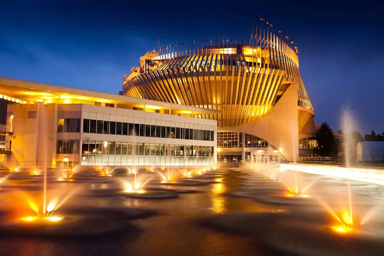 The Casino de Montreal glimmers in the evening. 