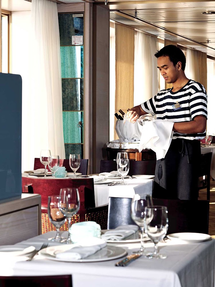 Sit down to dinner with linen tablecloths, crystal, china and attentive table service at Canaletto, a table-service dinner option without an extra surcharge aboard Nieuw Amsterdam.