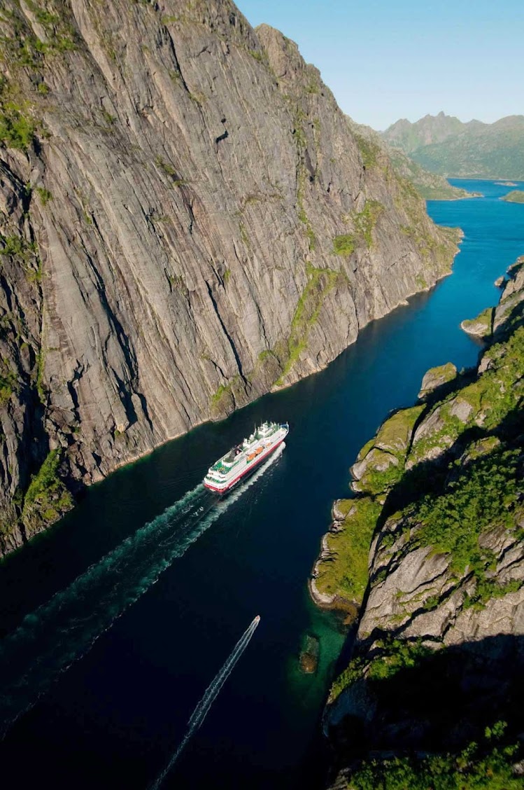 Experience Trollfjorden, a spectacular fjord in Lofoten, Norway,  aboard Hurtigruten's ship Nordkapp.