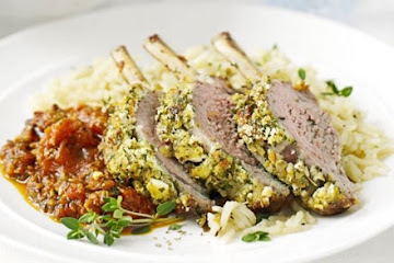 Feta-crusted lamb with rich tomato sauce