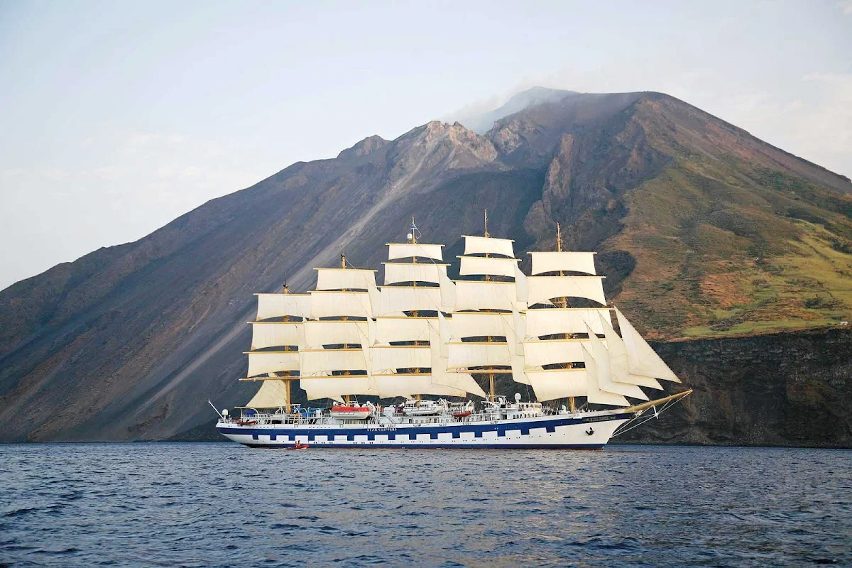 Royal-Clipper-at-Stromboli-Italy - Get breathtaking views of Stromboli, Italy's large volcano, as Royal Clipper sails the Tyrrhenian Sea, part of the Mediterranean.
