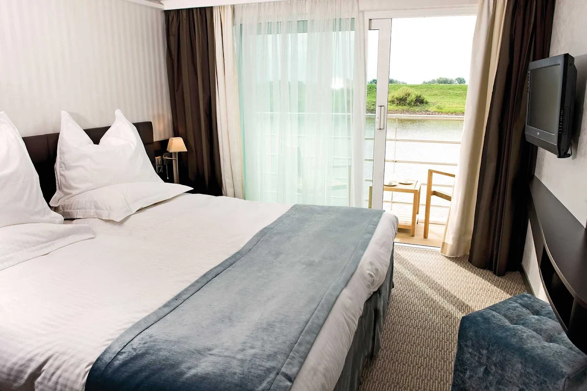 Scenic-Cruises-With-Balcony - Guests aboard a Scenic Cruises river cruise can enjoy the passing landscapes from a private balcony only steps away from their beds.