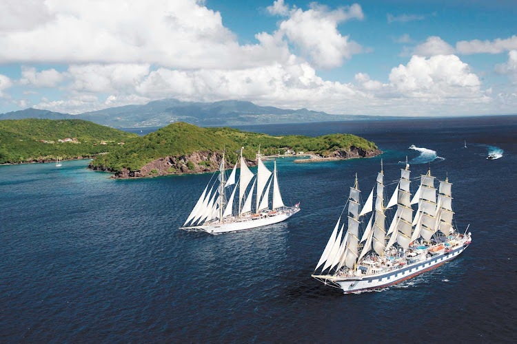 Royal Clipper, right and Star Clipper shooting the pass.