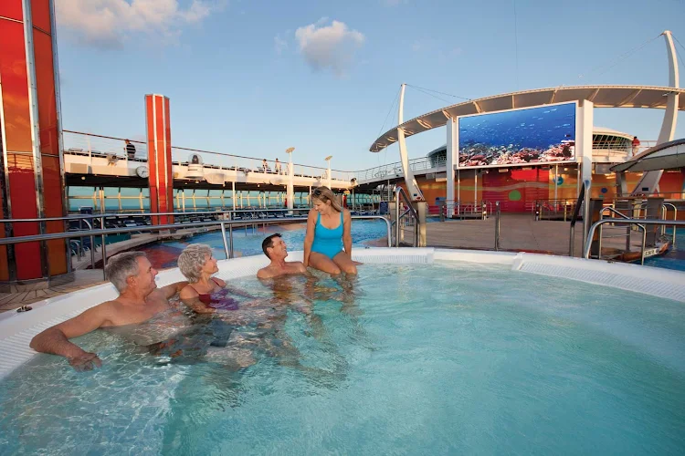 Gather in one of Freedom of the Seas' whirlpools to watch sporting events and family feature films on the large outdoor screen.
