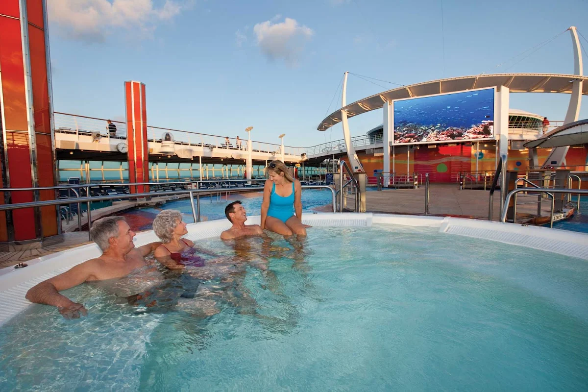 Freedom-of-the-Seas-poolside-screen - Gather in one of Freedom of the Seas' whirlpools to watch sporting events and family feature films on the large outdoor screen.