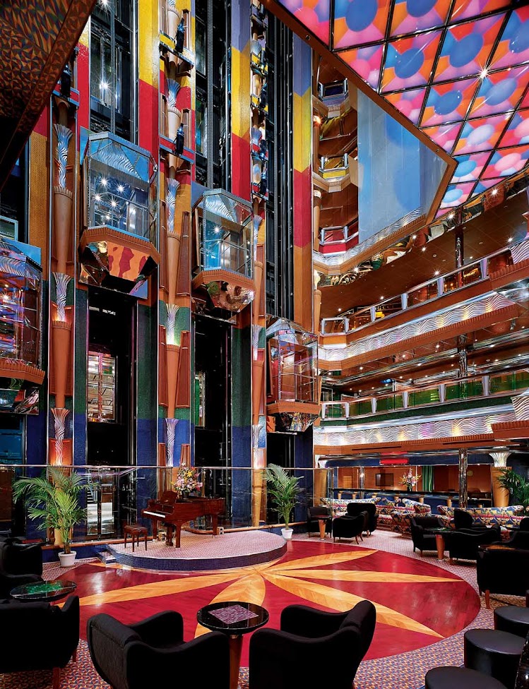 Sit with a friend, a drink and some live piano music in Carnival Glory's vibrant Colors Lobby.